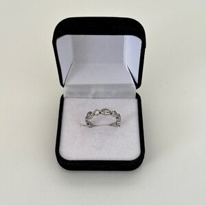 Elegant Silver Ring with Zirconia accents